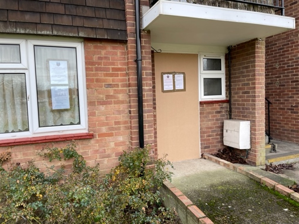 Photograph of a front door of a house