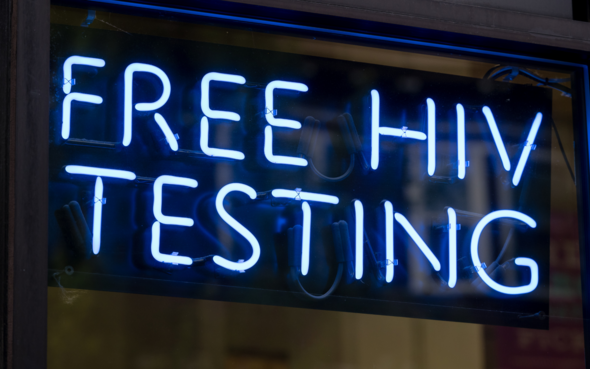 Blue neon sign saying Free HIV Testing