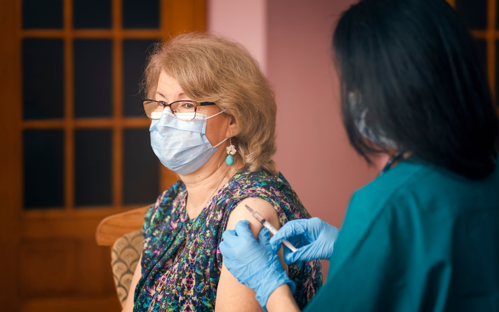 Lady getting a vaccine