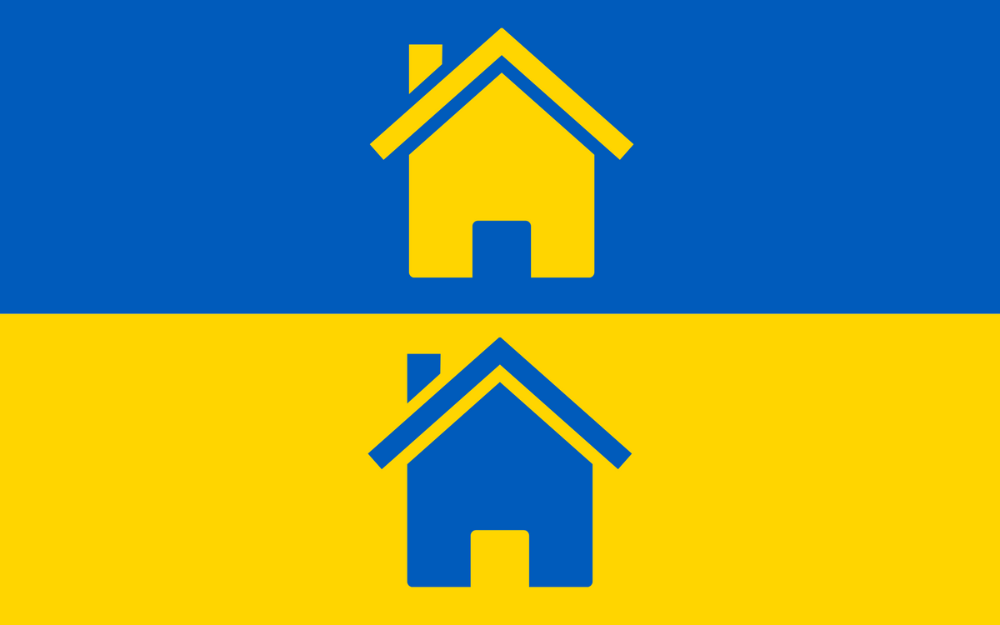 Two housing icons on a Ukrainian national flag