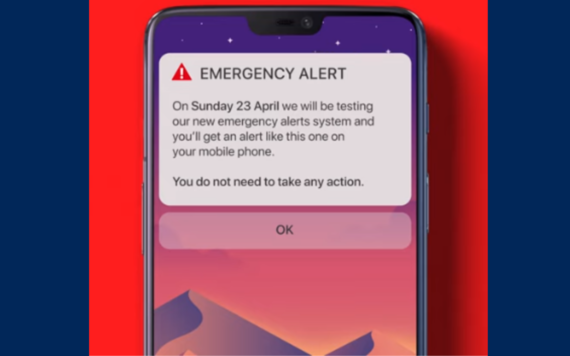 A mobile phone showing the emergency alert message