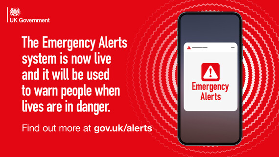 A smartphone with an alert message, text reads: The emergency Alerts system is now live and will be used