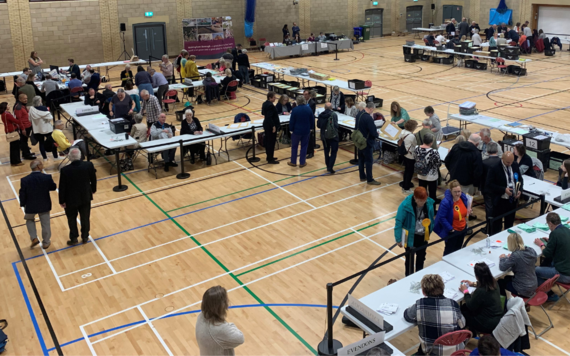 Ballot papers being coutned by hundreds of colleagues at Loddon Valley Leisure Centre