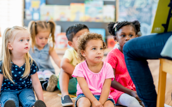 Some small children listening to stories 