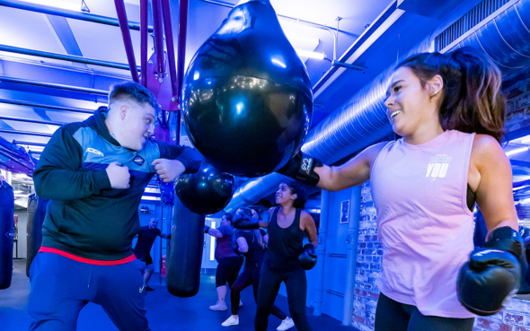 BXGFit - two people using the punchbags
