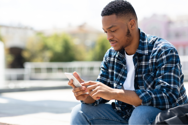 Man using smart phone
