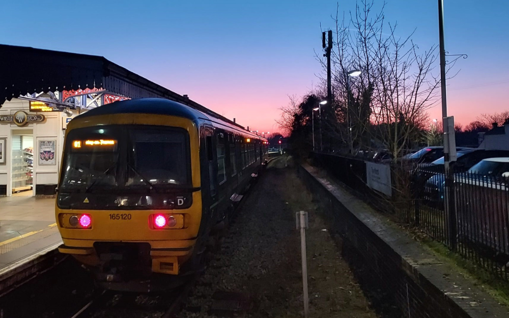 A GWR train at Twyford station at dusk