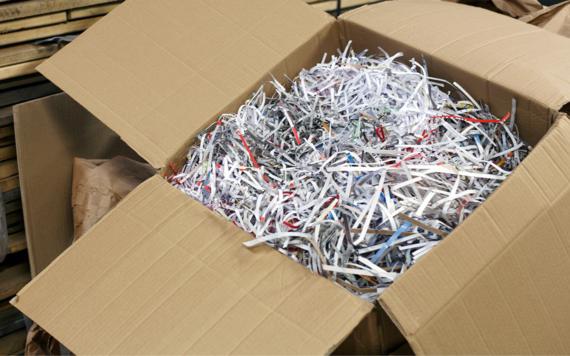 A close-up of a box of shredded paper 