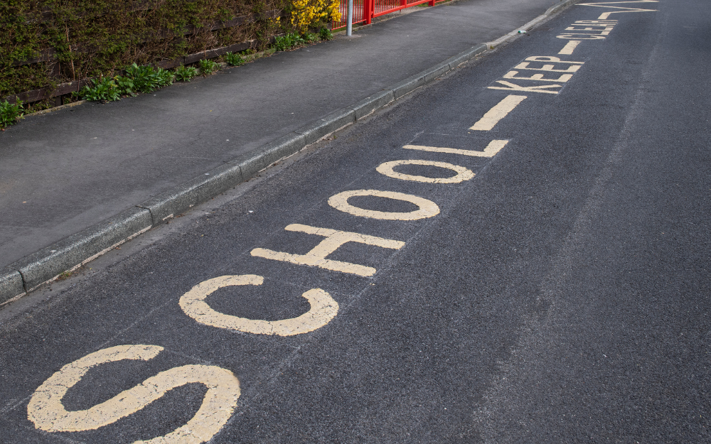 School keep clear markings on a road outside a school