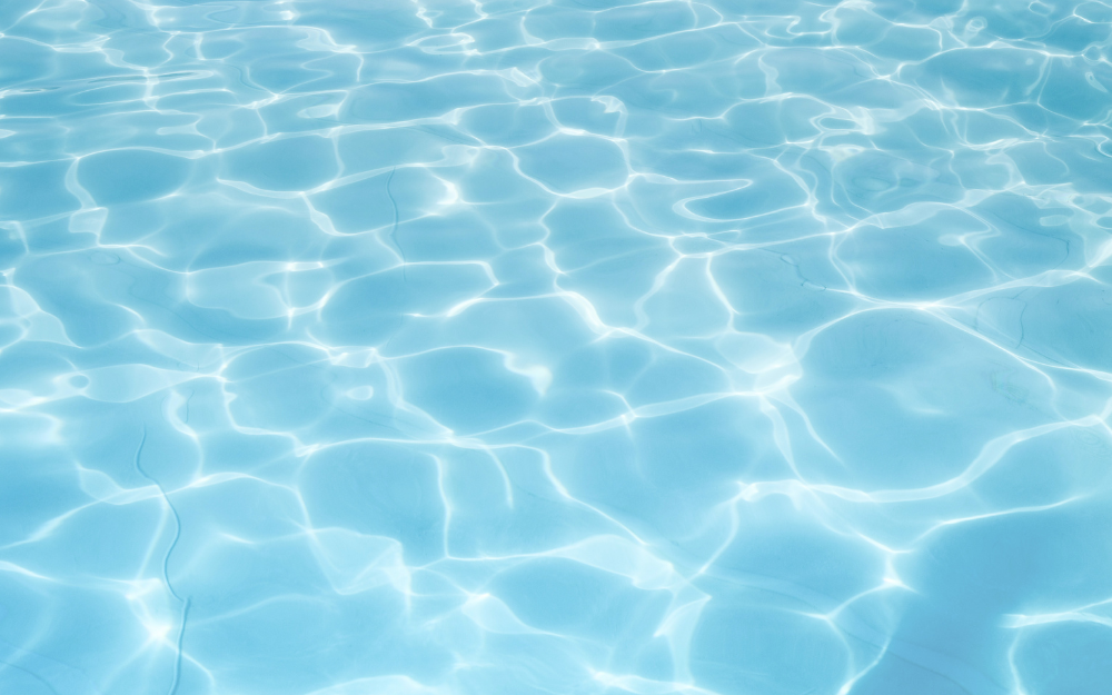 Shimmering water in a paddling pool on a sunny day