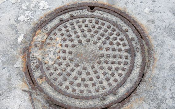 Close up of a manhole cover