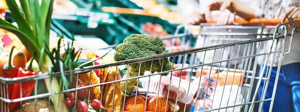 Shopping trolley with food in it