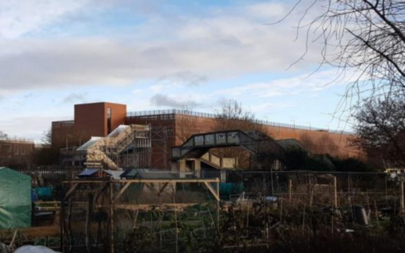 Taken from the neighbouring allotments, shows Tan House footbridge over to the multistorey car park