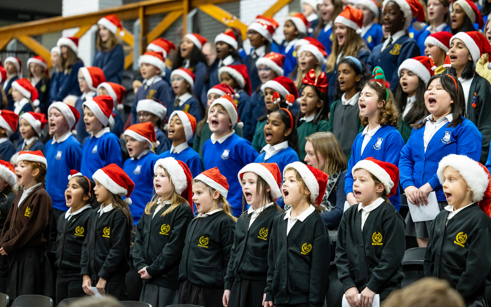 Dozens of children belting out Christmas carols at the Mayor's Carol Concert earlier this month