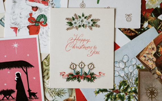 A top view of stacks of Christmas cards