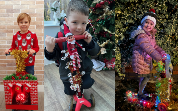 Three children on scooters with Christmas decorations