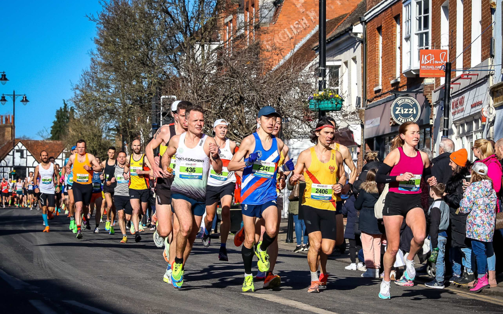 Runners going through Wokingham town centre at a previous half marathon