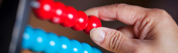 Someone counting on an abacus