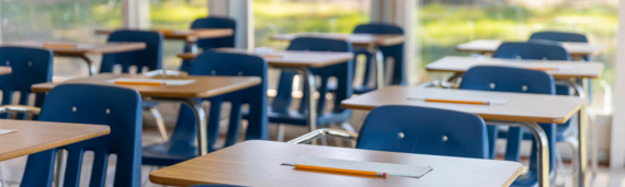 Empty desks in a classroom