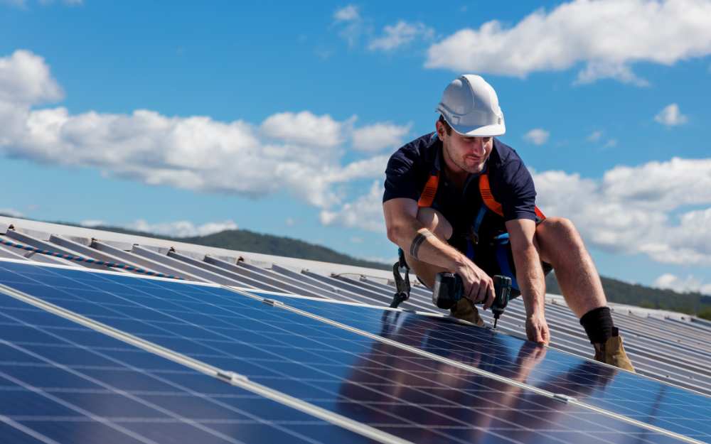 Solar panels being installed on the roof of a home