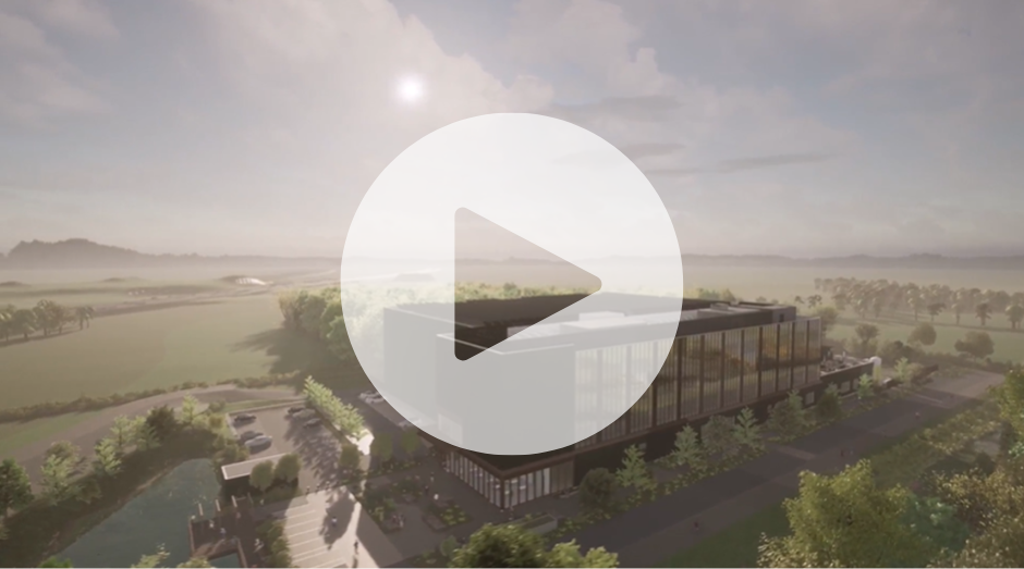 aerial artist's impression of a modern office building surrounded by beautiful countryside, with a "play video" symbol superimposed