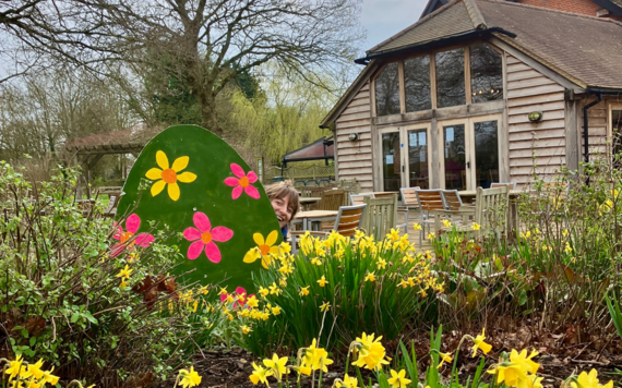 A giant Easter egg hidden in the garden in front of the cafe at Dinton Pastures