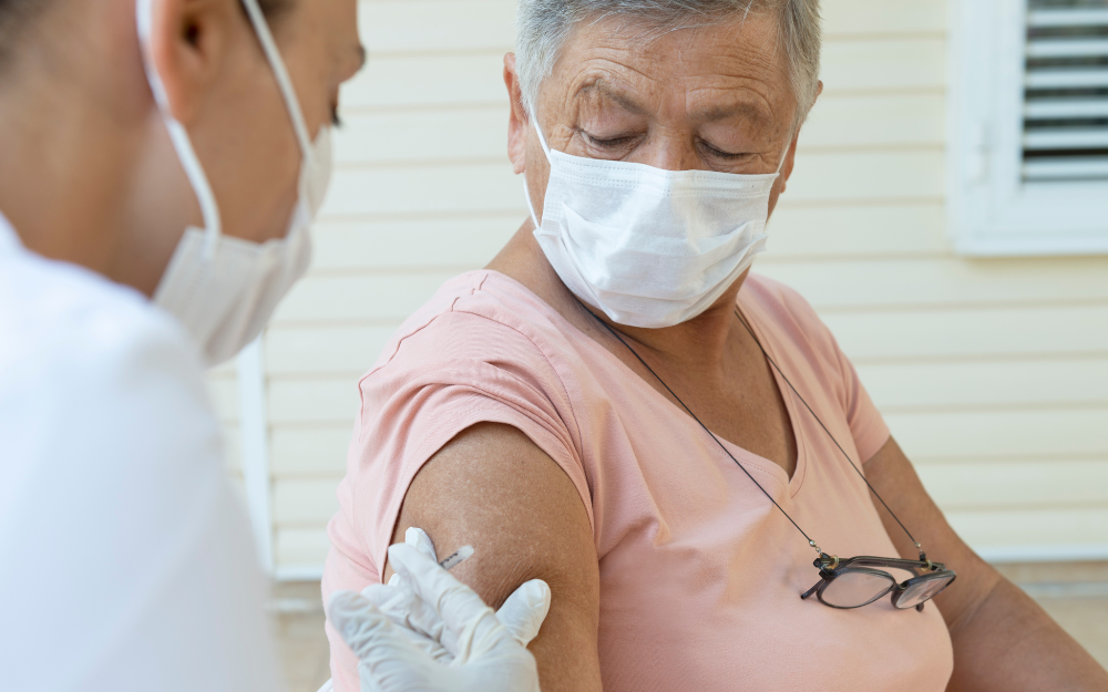 An older women gets a vaccine