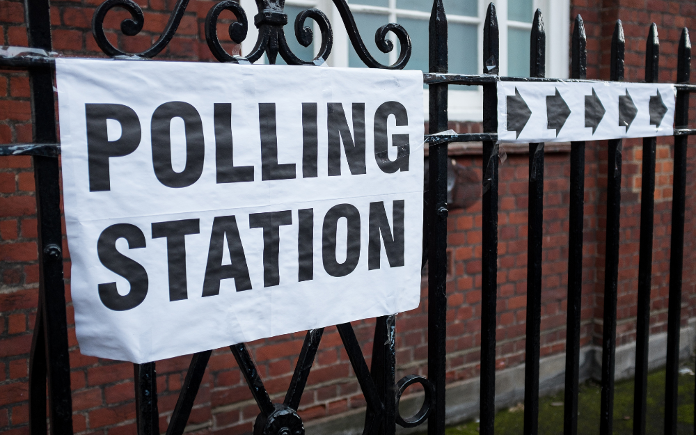 Polling station sign outside a place for voters