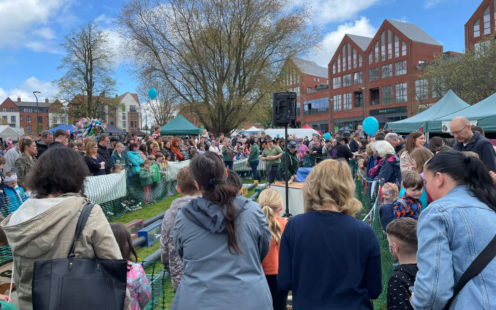 Crowds gather in Elms Field in Wokingham for the May Fayre