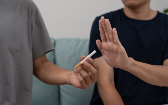 Someone refusing a cigarette