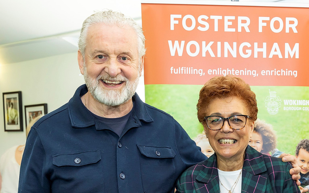 Foster carers Havva and Jim at an information event