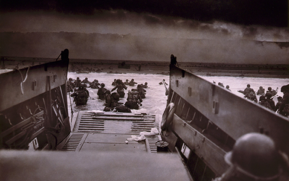 Crews exiting a boat on D day