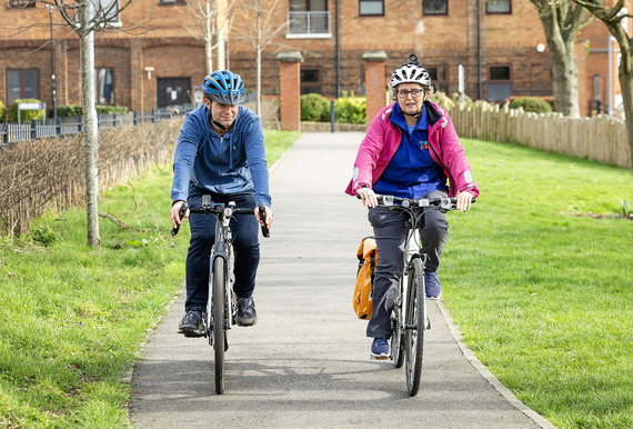 Two people cycling