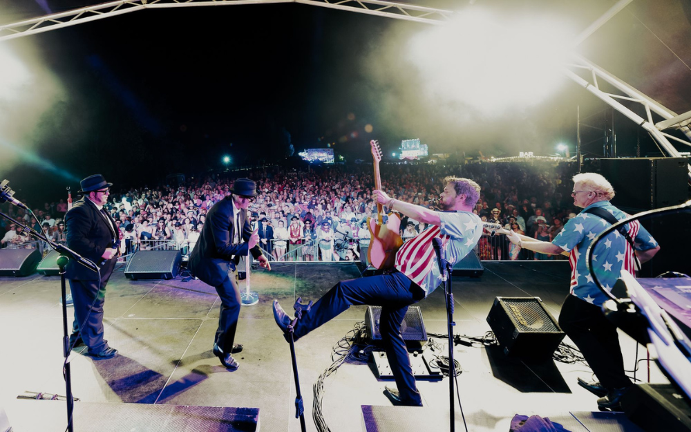 Four piece tribute band take to the stage in front of hundreds at Marvellous Festival