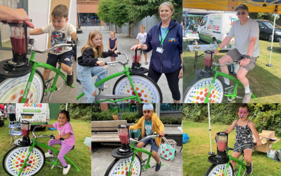 Chlidren and adults using our smoothie bike