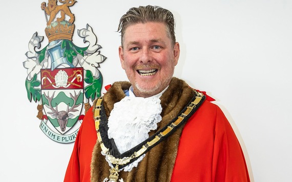 Headshout of borough mayor Cllr Adrian Mather in front of the council's crest