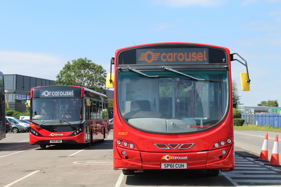 Two Carousel buses