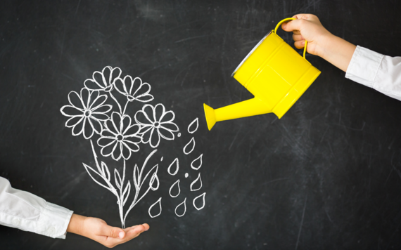 Image of watering a flower and it growing