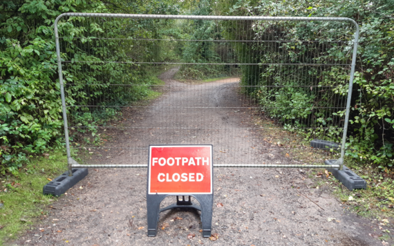 A section of footpath at Dinton Pastures being closed off for upgrade work
