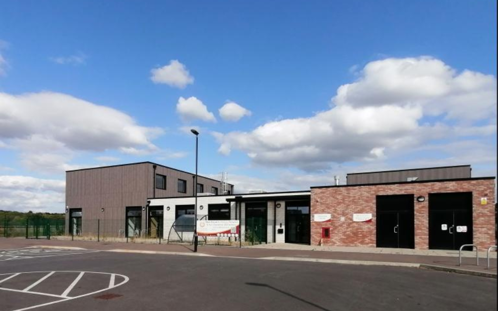 A vacant, modern community centre building ready for occupation