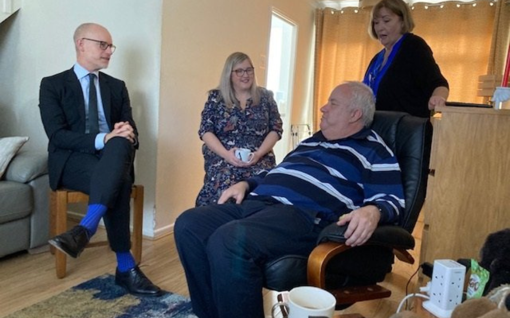 Care Minister Stephen Kinnock talks to people during his visit to some of the borough's care facilities