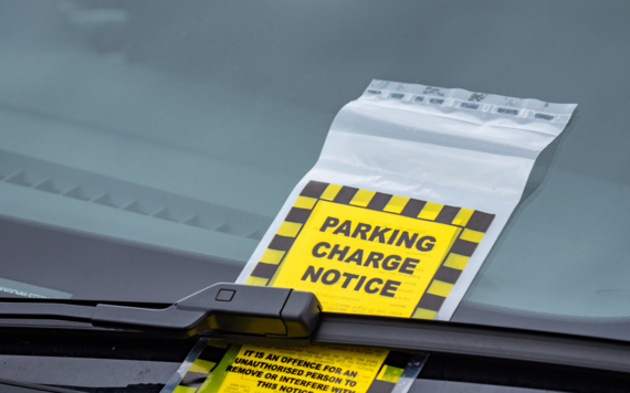 Parking notice under a windscreen wiper