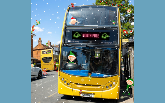 Bus at a stop in Wokingham town centre with elves superimposed in different positions around the scene