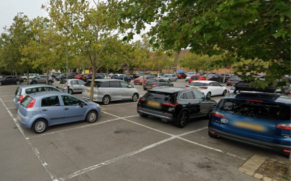 Cars parked in a car park in Woodley