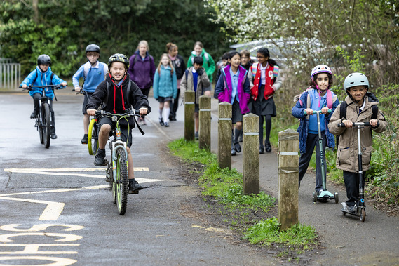 Children walking, cycling and scooting to school