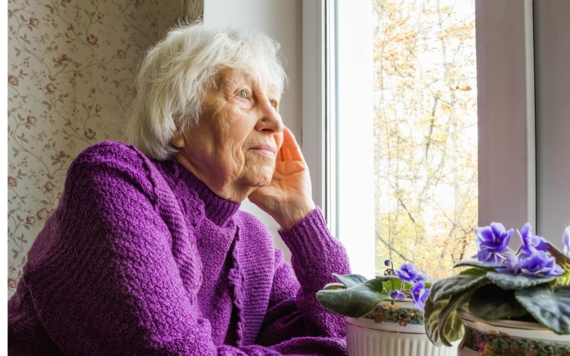 Lady looking out the window