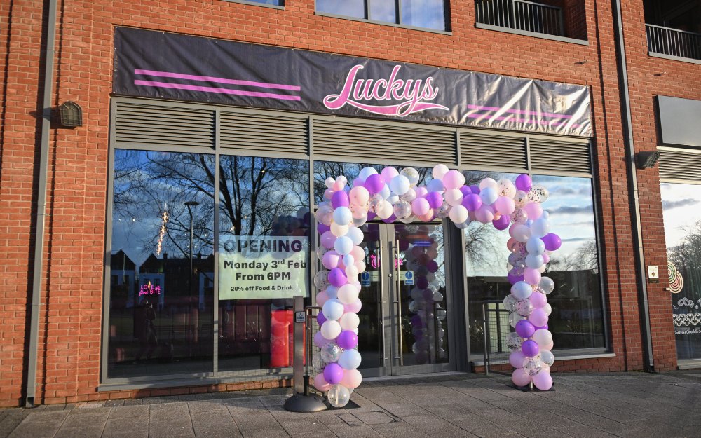 The entrance with a balloon arch into Luckys Diner in Wokingham