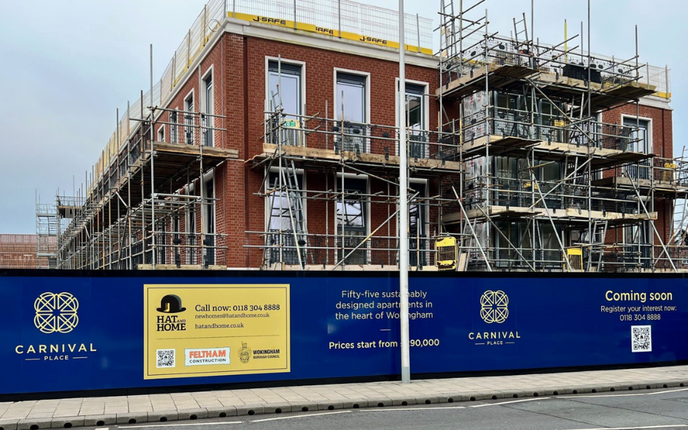 Hoardings and scaffolding outside Carnival Place in Wokingham