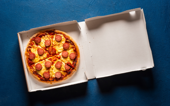 A top view of a pizza in a box