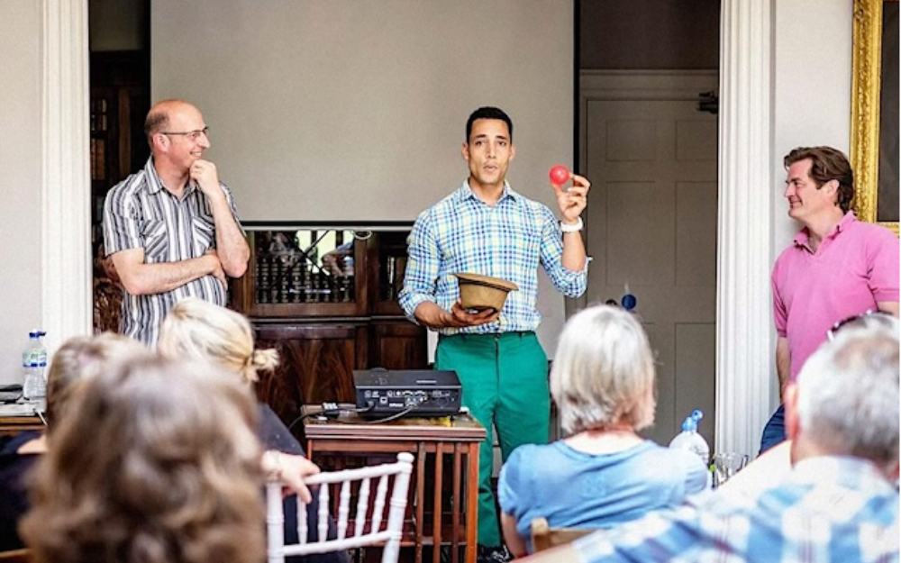 Wayne Lindsay presents during a creative thinking workshop for businesses